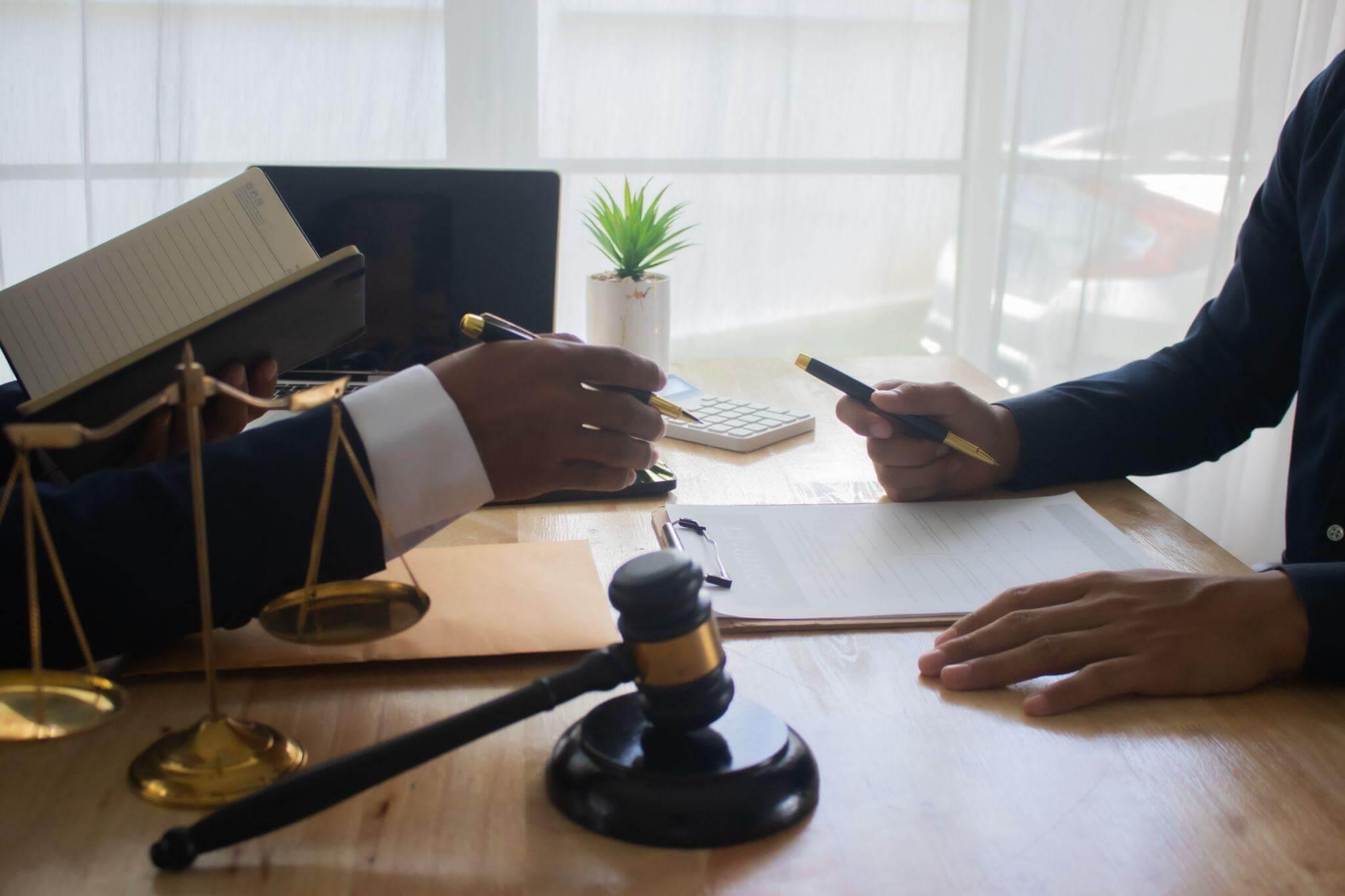 A couple sitting at a table discussing high net-