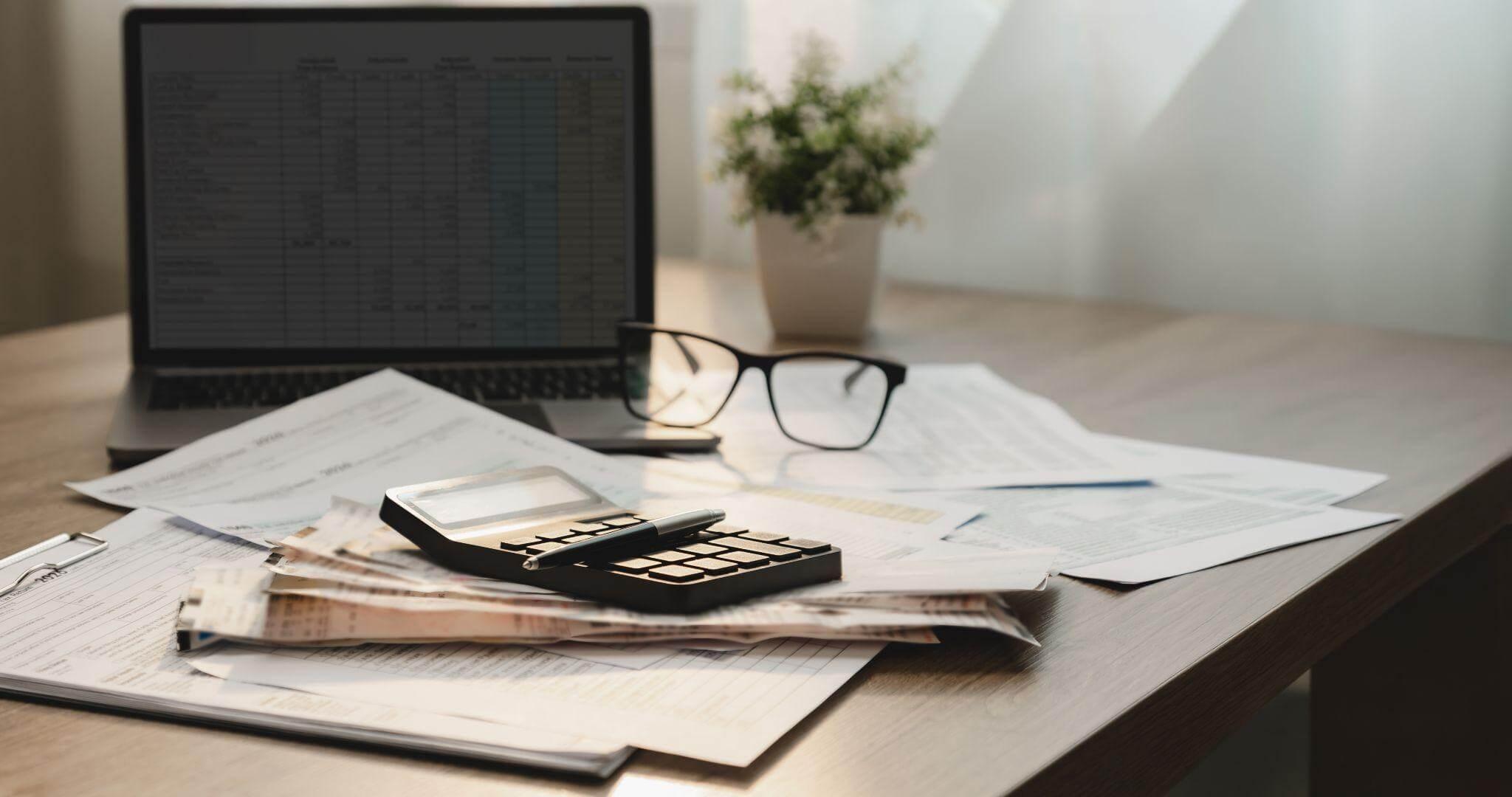 Laptop on a desk for divorce forensic accounting services